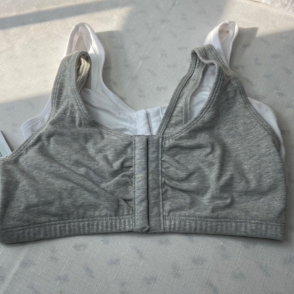 2 each fruit of the loom gray/white stretchy sz 36 bra, front eyelet closure NWT